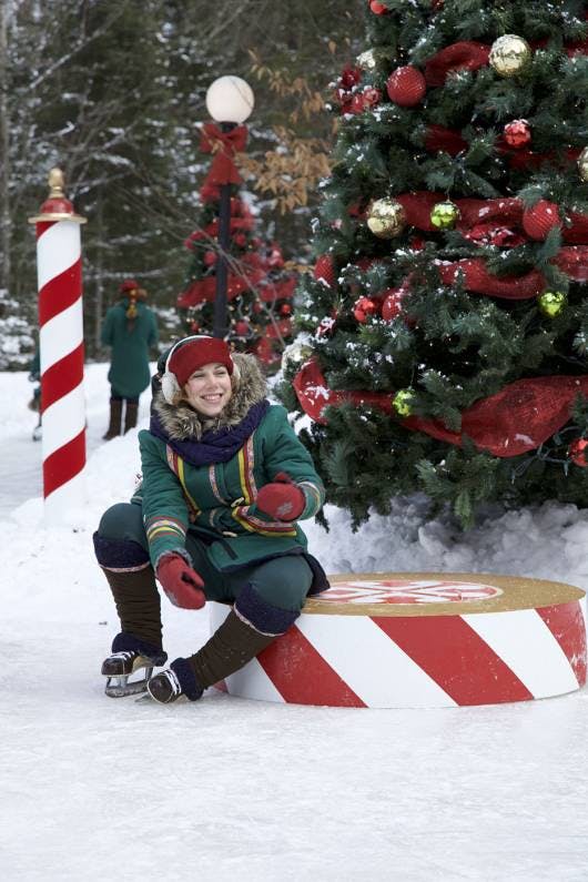 Explore the magical wonders of Santa's Village in the North Pole with Mrs. Claus' photo of elves taking a break from skating.